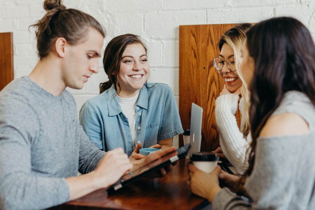 a group of customers in an independent coffee shop